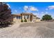 Beautiful stucco home with well-maintained landscaping and a circular driveway at 38087 E 147Th Pl, Keenesburg, CO 80643