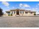 Stunning single story stucco home with a gravel driveway and manicured landscaping at 38087 E 147Th Pl, Keenesburg, CO 80643