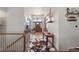 Grand entryway features a high ceiling, stylish decor, and a welcoming atmosphere at 38087 E 147Th Pl, Keenesburg, CO 80643