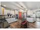 Stylish kitchen featuring an island, stainless steel appliances, and plenty of counter space at 38087 E 147Th Pl, Keenesburg, CO 80643