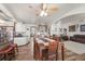 Open floor plan featuring an eat in dining area, kitchen and cozy living room at 38087 E 147Th Pl, Keenesburg, CO 80643