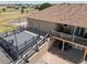 Multi-level deck and patio area with outdoor seating, perfect for enjoying the backyard and outdoor dining at 38087 E 147Th Pl, Keenesburg, CO 80643