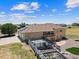Large backyard with a deck, patio, and lush greenery, complemented by solar panels on the roof at 38087 E 147Th Pl, Keenesburg, CO 80643