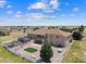 Expansive backyard featuring a deck, patio, and landscaping, perfect for outdoor living and entertaining at 38087 E 147Th Pl, Keenesburg, CO 80643