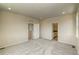 Neutral bedroom with carpet, recessed lighting, and doors leading to the bathroom and hallway at 23951 E 40Th Ave, Aurora, CO 80019