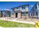 Attractive two-story home featuring stone accents, landscaped front yard, and modern design at 23951 E 40Th Ave, Aurora, CO 80019