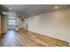 Expansive living area with hardwood floors and plenty of natural light from multiple windows at 23951 E 40Th Ave, Aurora, CO 80019