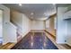 Spacious living room with hardwood floors and staircase leading to the upper level at 23951 E 40Th Ave, Aurora, CO 80019