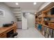 Finished basement area featuring ample storage, workspace, and natural lighting for productivity at 564 S Grant St, Denver, CO 80209