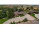 Aerial view of a ranch-style home with a large yard at 14121 Countryhills Dr, Brighton, CO 80601