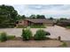 Ranch home with large driveway and expansive yard at 14121 Countryhills Dr, Brighton, CO 80601