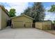 Two-car attached garage with extra storage shed at 14121 Countryhills Dr, Brighton, CO 80601