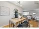 Bright dining room with hardwood floors, modern lighting, and stylish decor at 3620 Fairfax St, Denver, CO 80207