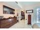 Bedroom featuring a large dresser and view of a walk-in closet at 540 S Forest St # 8-101, Denver, CO 80246