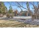 Community tennis court surrounded by lush landscaping and trees at 540 S Forest St # 8-101, Denver, CO 80246