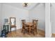 Dining room with hardwood floors and a modern ceiling light at 14206 E 1St Dr # B10, Aurora, CO 80011