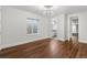 Spacious bedroom boasts hardwood floors, recessed lighting, and ensuite access at 2218 S Clayton St, Denver, CO 80210