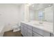 This bathroom features double sinks and vanity at 5668 Galena St, Denver, CO 80238