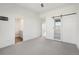 This bedroom has an ensuite bathroom and sliding barn door at 5668 Galena St, Denver, CO 80238