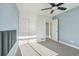 This bright bedroom has two closets and carpet flooring at 5668 Galena St, Denver, CO 80238