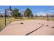 Basketball court surrounded by lush green grass in a park, great for active recreation at 1529 Ashcroft Dr, Longmont, CO 80501