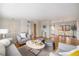 Bright living room with hardwood floors, comfortable seating, and stylish decor at 1529 Ashcroft Dr, Longmont, CO 80501