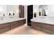 Bright bathroom features dual vanity with modern lighting, quartz countertops, and stylish fixtures at 860 Diamond Ridge Cir, Castle Rock, CO 80108