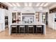 Modern kitchen with a large center island, sleek cabinetry, and state-of-the-art appliances at 860 Diamond Ridge Cir, Castle Rock, CO 80108