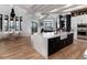 Gourmet kitchen featuring a large center island, stainless steel appliances, and a breakfast nook at 860 Diamond Ridge Cir, Castle Rock, CO 80108