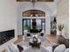 Spacious living room with high ceilings, a modern fireplace, and an expansive view at 860 Diamond Ridge Cir, Castle Rock, CO 80108