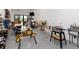 Spacious workshop with power tools, work benches, and a sink at 860 Diamond Ridge Cir, Castle Rock, CO 80108