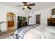 Spacious bedroom with ensuite bathroom and stylish furnishings, offering a private retreat at 22134 Wintergreen Way, Parker, CO 80138