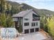 Luxury home with three-car garage and mountain views at 10518 Christopher Dr, Conifer, CO 80433