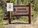 Conifer Mountain community entrance sign at 10518 Christopher Dr, Conifer, CO 80433