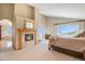 Main bedroom with fireplace and ensuite bathroom at 10518 Christopher Dr, Conifer, CO 80433