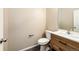 Clean bathroom with vanity, toilet and flooring at 5255 Memphis St # 917, Denver, CO 80239