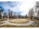 Open green space with benches and walkways in community at 5255 Memphis St # 917, Denver, CO 80239