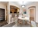 Kitchen with breakfast bar and dining area at 5255 Memphis St # 917, Denver, CO 80239