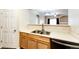 Functional kitchen with double sink and dishwasher at 5255 Memphis St # 917, Denver, CO 80239