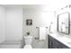 Bathroom featuring modern fixtures, including a floating vanity, subway tile shower, and granite-look seat at 8511 Cherry Ln, Westminster, CO 80031