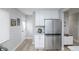 Bright, updated kitchen featuring stainless steel appliances, ample counter space, and modern finishes at 8511 Cherry Ln, Westminster, CO 80031