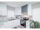 Modern kitchen with stainless steel appliances, ample counter space, and stylish finishes at 8511 Cherry Ln, Westminster, CO 80031