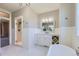 Bright bathroom with marble countertop, stylish finishes, and walk-in shower at 41975 Muirfield Loop, Elizabeth, CO 80107