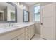 This stylish bathroom features double sinks, modern fixtures, and ample counter space at 41975 Muirfield Loop, Elizabeth, CO 80107