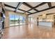 Bright and open floor plan with hardwood floors and large sliding glass doors at 41975 Muirfield Loop, Elizabeth, CO 80107