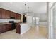 Well-equipped kitchen featuring granite countertops and modern appliances at 5895 S Taft Ct # H, Littleton, CO 80127
