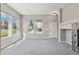 Spacious living room with ample natural light and plush carpeting at 5895 S Taft Ct # H, Littleton, CO 80127