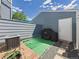 Small outdoor space featuring a patio area, gravel, and a barbecue grill at 2007 S Balsam St, Lakewood, CO 80227
