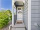 Inviting front entryway features a glass-paneled door and a welcoming mat, perfect for greeting guests at 2007 S Balsam St, Lakewood, CO 80227