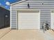 Exterior view of a white garage door at 2007 S Balsam St, Lakewood, CO 80227